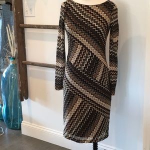 Classic work dress with modern design.